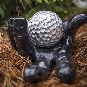 Golf themed sculptures located throughout the property.